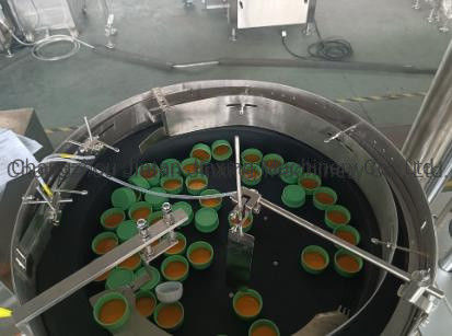 Haarverzorgingsproducten Ronde fles lineaire dekselmachine Volledig automatisch